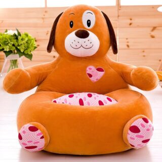 Brown and pink animal-shaped sofa pouffe with dog motif in a living room