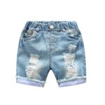 Boy's ripped denim summer shorts with white background