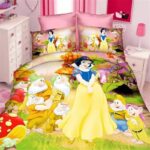 Colourful cartoon comforter for a pink girl's bedroom
