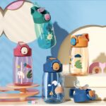 Children's cartoon water bottle in colored tritan with blue and beige background