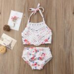 Girl's 2-piece swimsuit with floral print and wooden bottom