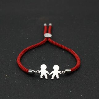 Friendship bracelet in red and silver stainless steel on a black background