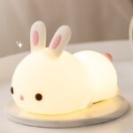 Silicone bunny night light with pink ears and black eyes