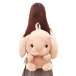 Pink girl's plush bunny backpack on a little girl's back