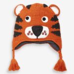 Orange children's knitted tiger hood with black nose and white mouth