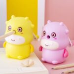 Children's 3D cartoon sharpener in yellow and pink with white mouth