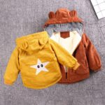 Children's yellow and brown cat ear hoodie on grey background with white eb star on back