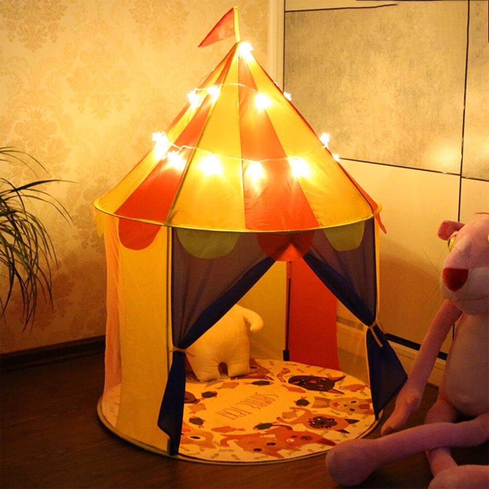 White and red children's circus tepee with lights in one room