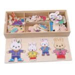 Wooden dressing puzzle with rabbits