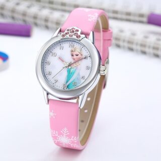 Elsa princess watch in pink, on a table next to the notebooks