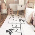 Children's floor mat with hopscotch pattern