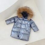 Waterproof and dirt-repellent fur jacket for children in grey with furry hood