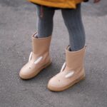 Genuine leather bunny boots for children with white ears in a little girl's feet
