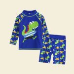 children's jersey, blue, with dinosaur design on top, with long-sleeved shirt and shorts